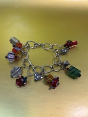 Charm Bracelet Metal Silver Tonewith A Lampwork Glass Bead 7.5 Inches Long .