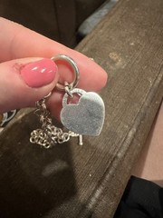 2 heart bracelets! One is sterling silver, and the other is stainless steel