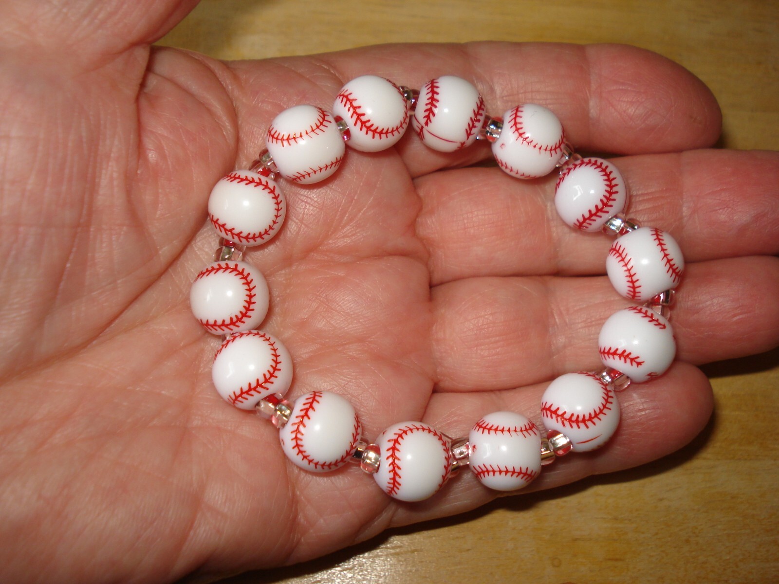 7 to 7 1/2" Stretch Magic Acrylic Baseball & Glass Bead Fan Bracelet gallery
