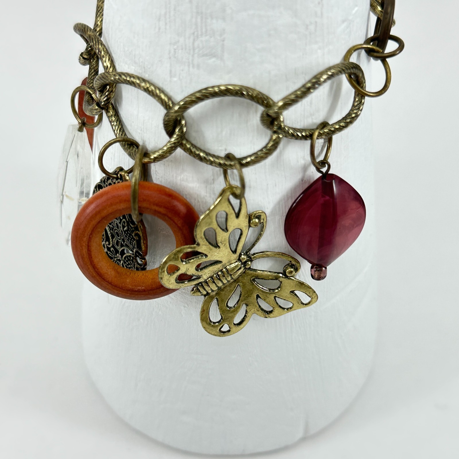 Bracelet Metal Plastic and Wood Dangling Charms on Chunky Curb Link Chain Vtg gallery