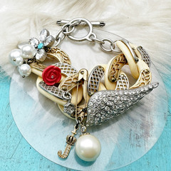 Vintage Juicy Couture Silver Gold Tone Crystal Wing Cream Riveted Charm Bracelet
