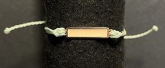 Pura Vida Bracelet Aqua Unbraided Cord W/ Cream Enameled Gold Rectangle Charm