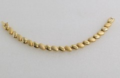 Unsigned Gold Tone Textured and High Polished Link Bracelet