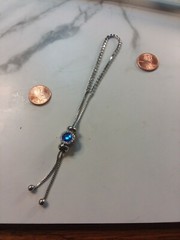 LU 6″-9″ Adjustable Tennis Bracelet with Blue Charm Read Description…