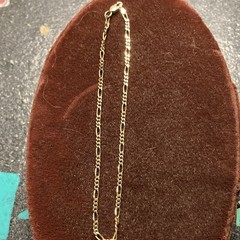 10k gold Figaro anklet.