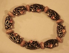 Handsome Sculpted Swirled Brasstone Beads Amber Rhinestones Stretch Bracelet
