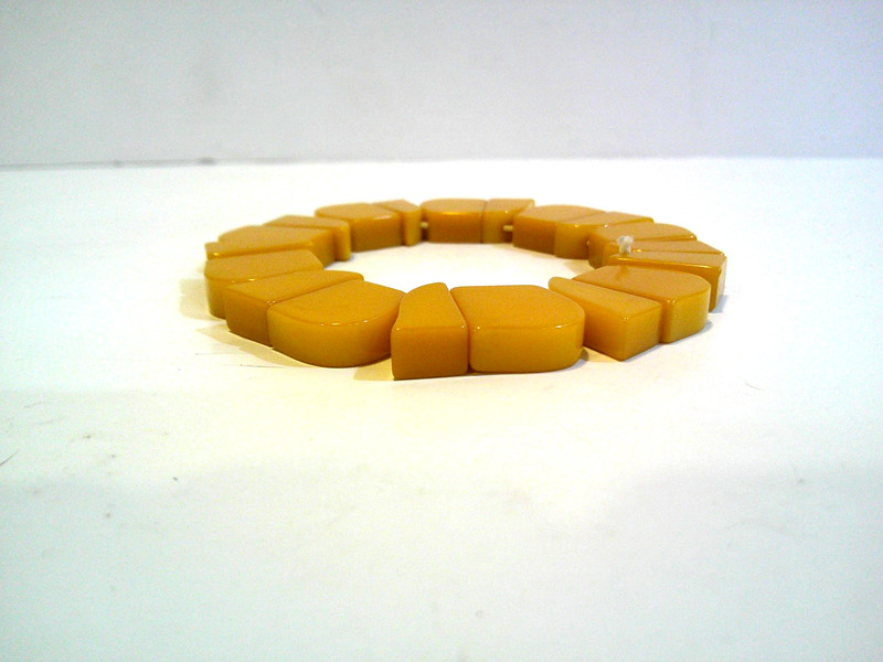 Bakelite Stretch Bracelet - Vintage 2in and up Orange Bangle gallery
