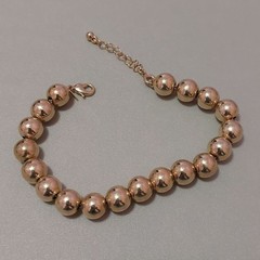 Avon Gold Tone Slider Ball Beads Strung Unto Gold Tone Chain Bracelet
