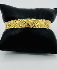 14k gold plated sterling silver Hawaiian scroll and plumeria floral bangle