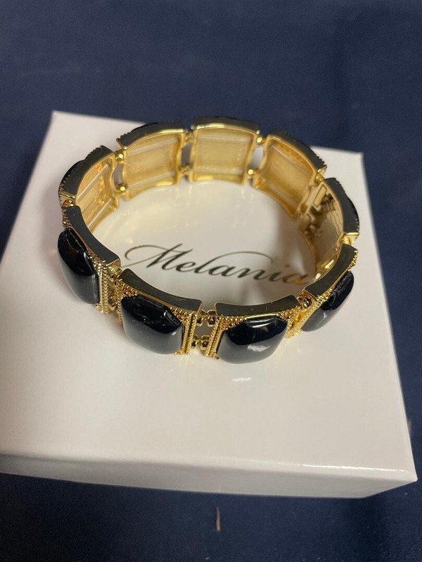 Melania Trump Gold Tone Stretch Bracelet With Black Stones gallery