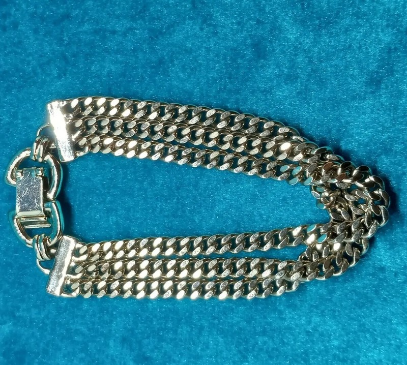 DKNY Gold Tone Triple Chains Bracelet. 1712 gallery