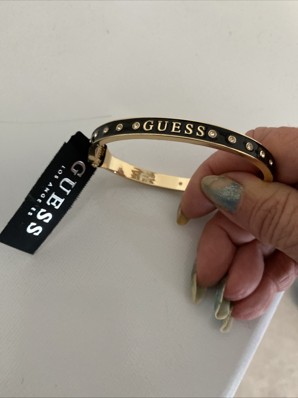 NEW GUESS Los Angeles Black On Gold Tone Rhinestone Logo Bracelet gallery