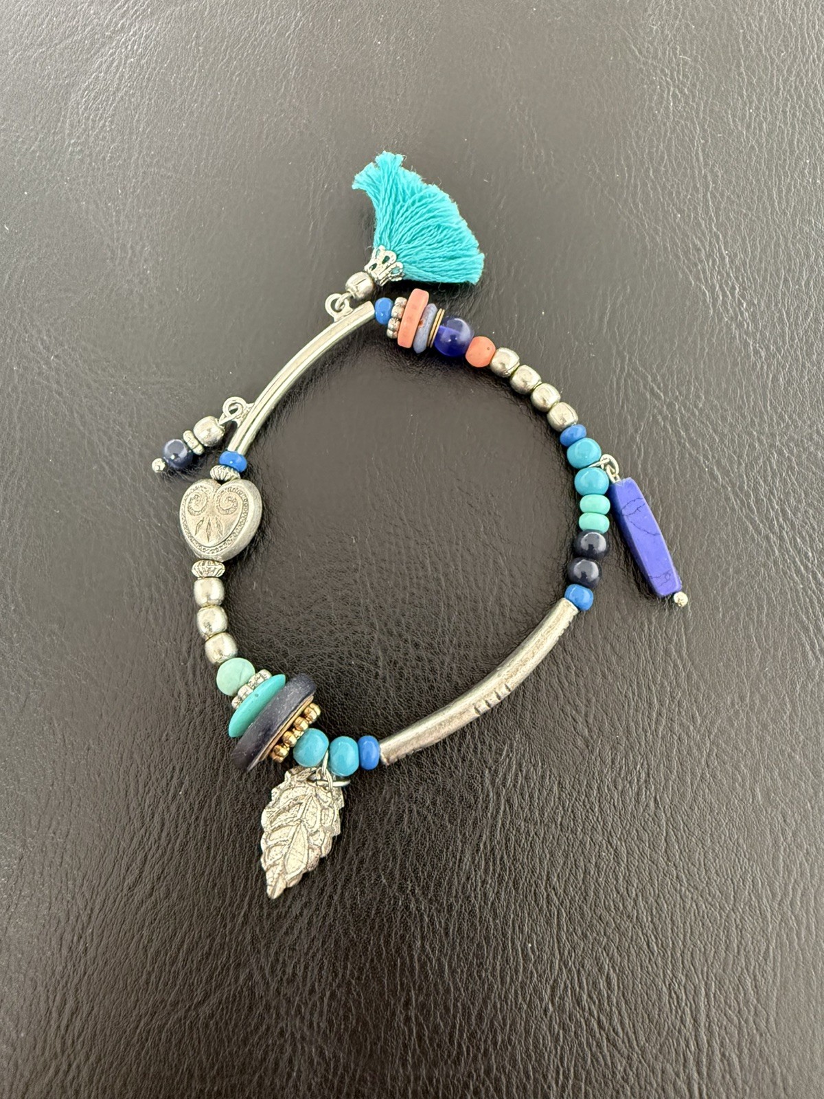 Beautiful Turquoise coloured Women Bracelet with multi charms gallery