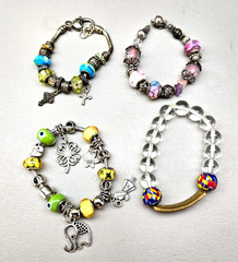 Lot of 4 Beaded Charm Bracelets Glass Beads Cross Elephant Floral Elegance