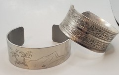 2 Wide Cuff Bracelets: Carved Floral Design, Etched Palm Tree Mountain Scene