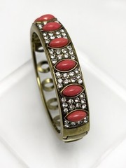 Heidi Daus “Armed with Charm” Crystal Bangle Bracelet – Coral Color – S/M
