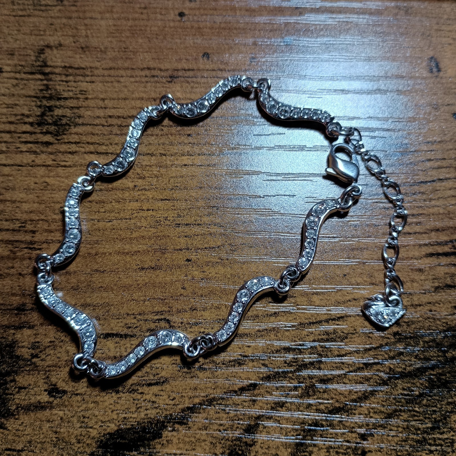 Never Worn Swarovski Wave Link Silver Tone Sparkle Bracelet 7 in. to 8 1/2 in. gallery