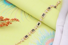 Elegant Rose Gold Plated Bracelet with Black Stones and Star Accents, XPBL0694
