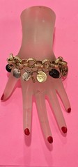 CHICOS dangle bracelet gold tone 9” long magnet strong snap, 9 hanging charms