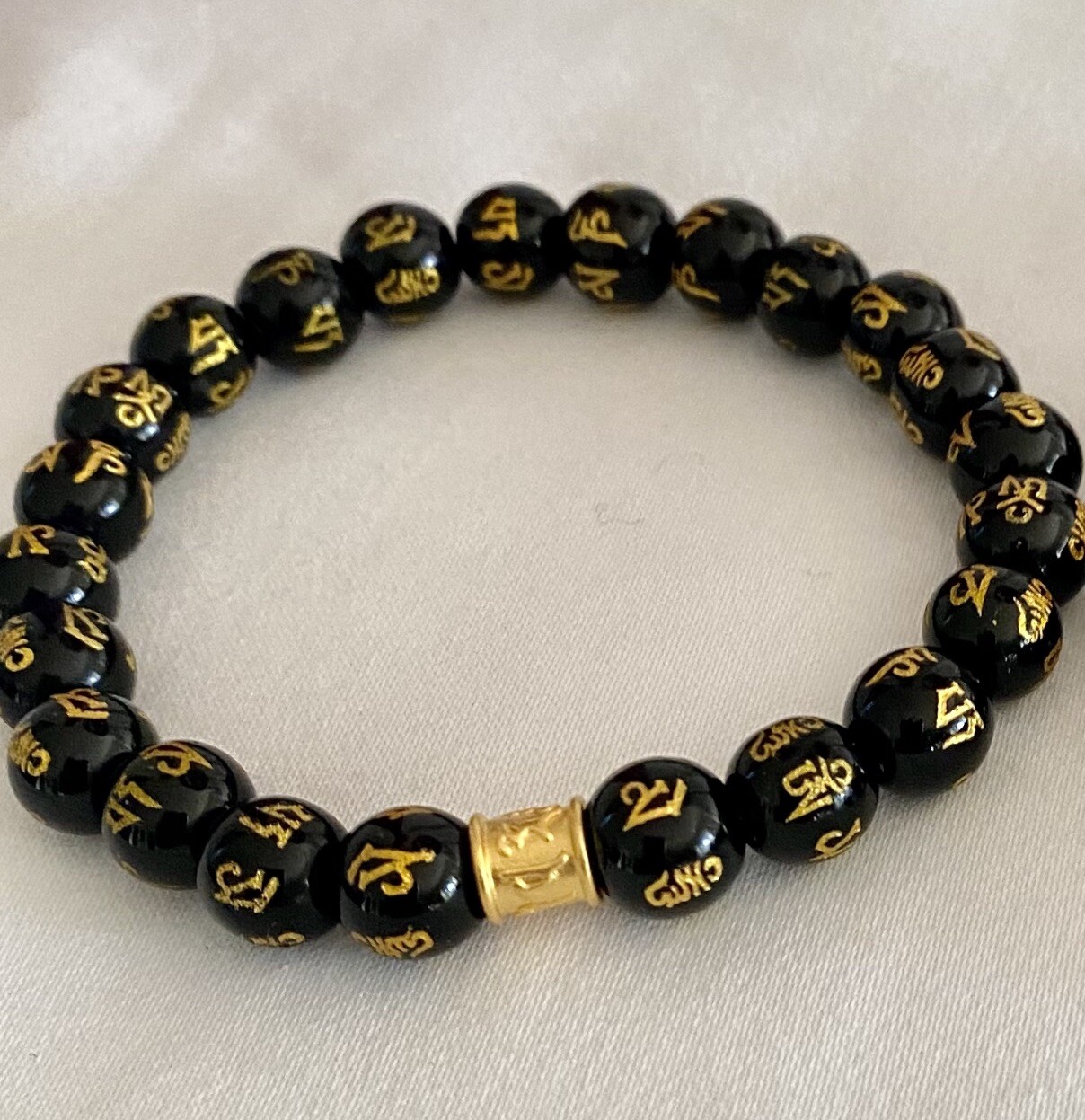 Piayao 24k Obsidian stone bracelets for male/female $ 65.00 each SALE $50 each gallery