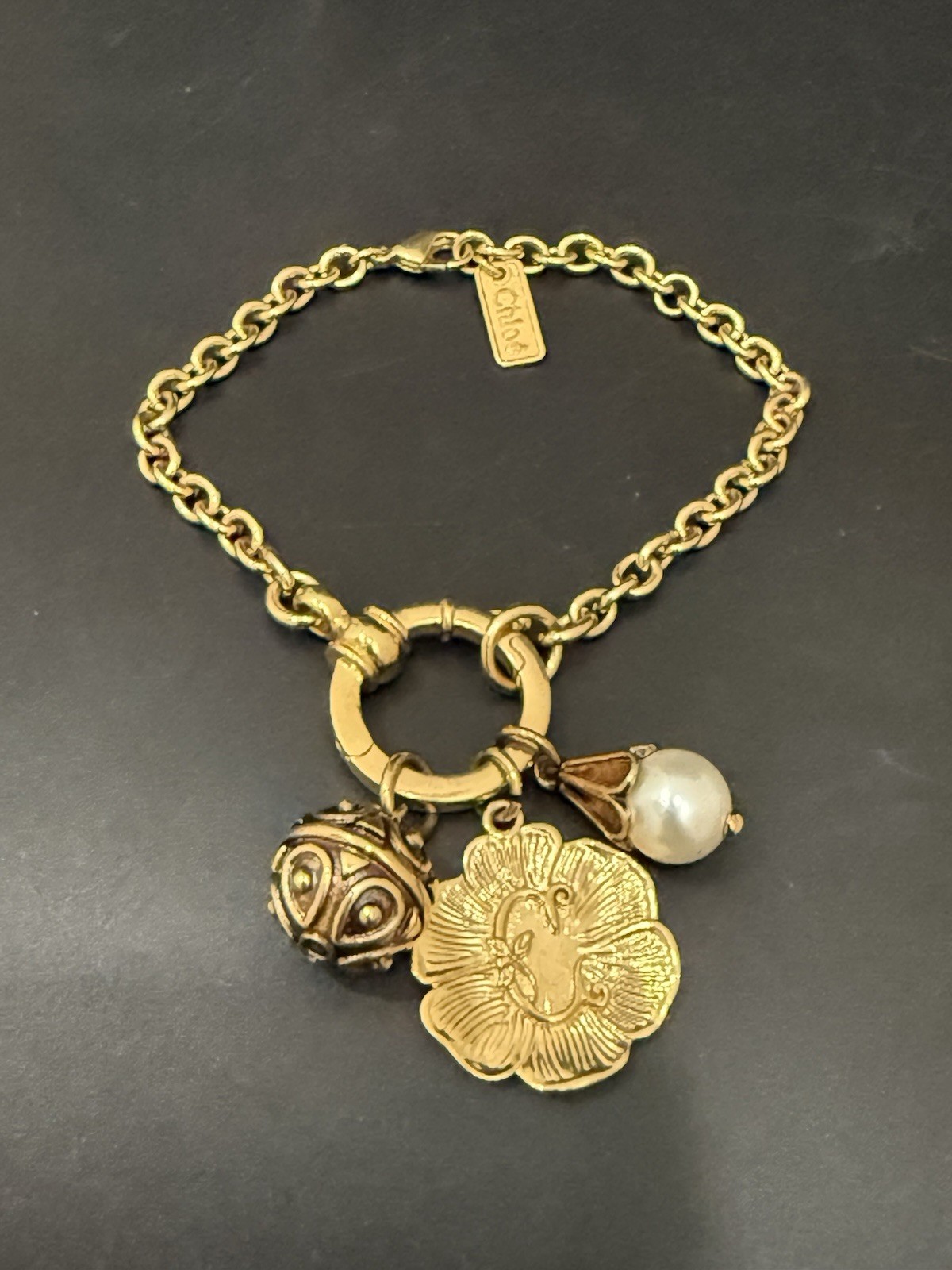 CHLOÉ Chloe Chateau Treasures Gold-tone Brass & Imitation Pearl Charm Bracelet gallery