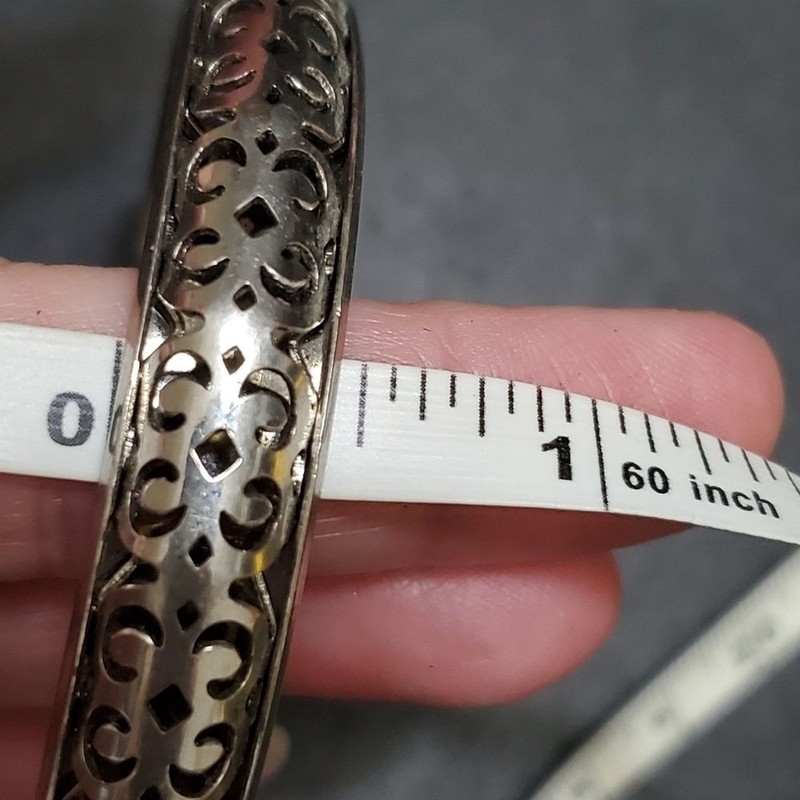 Silver tone filigree bangle bracelet Approx 8" gallery