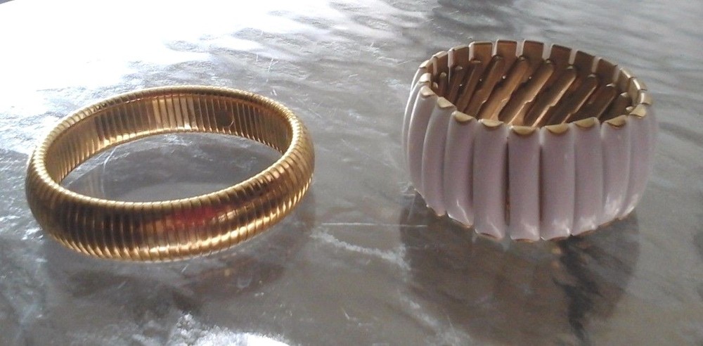 LOT OF TWO VINTAGE METAL/PLASTIC BRACELETS 1 GOLD COLOR&1 WHITE AND GOLD COLORED
