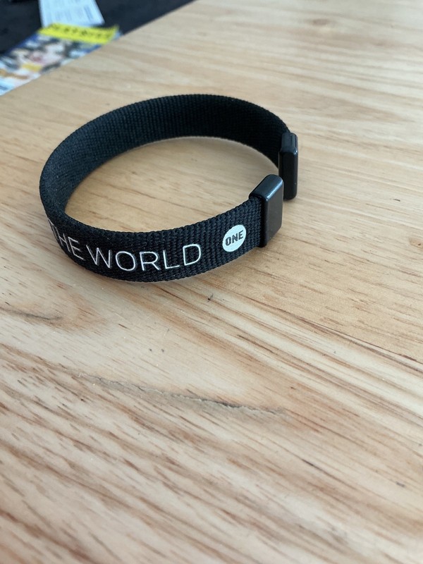 “ONE” organization bracelet from world AIDs day concert event in 2015 gallery