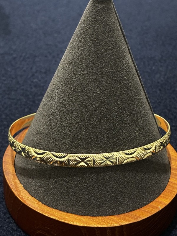 Gold Toned X Pattern Round Bangle Bracelet Metal gallery