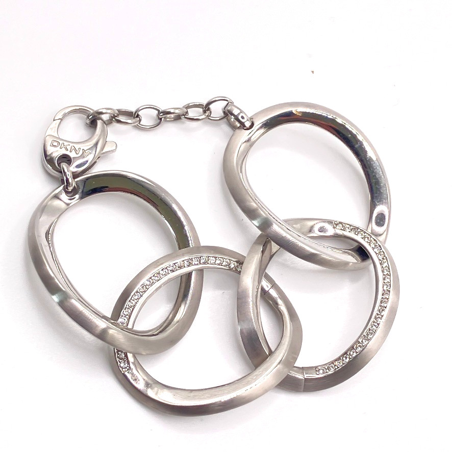 DKNY bracelet large oval link sparkly rhinestones silver tone metal 18cm chunky