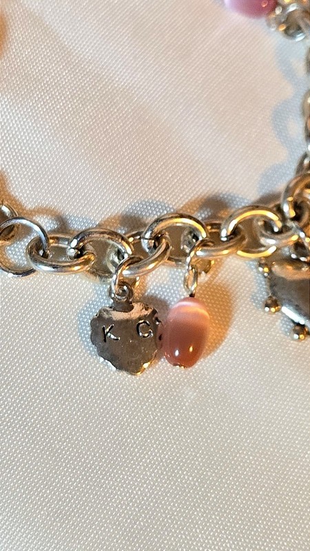 Kenneth Cole Charm Bracelet Silver Tone Pink Cats Eye 90s KC gallery