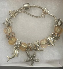 7” Sea Creatures Charm Bracelet Gold And Silver Themed With Locking Bead Stops.