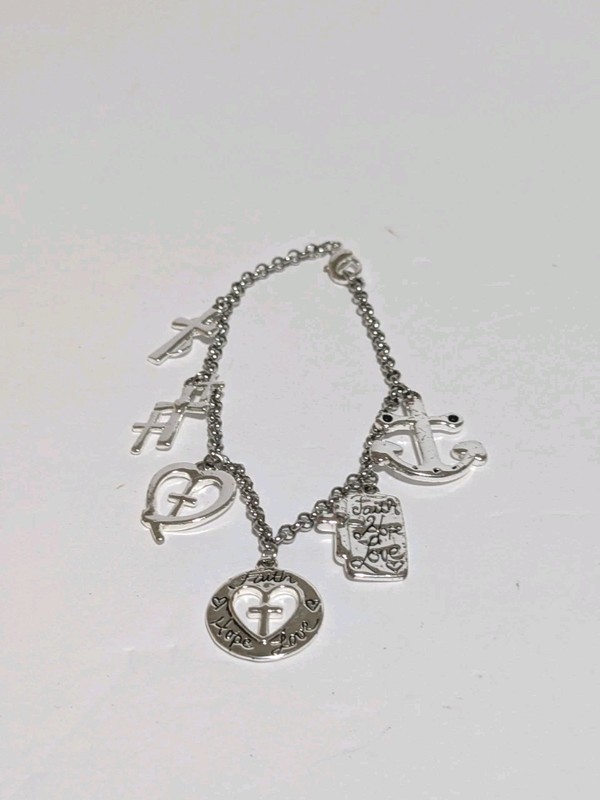 Silver Tone Religious Cross Charm Bracelet With 6 Cross Charms Size 7. gallery