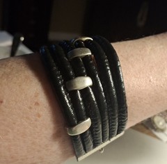 Pre-owned no brand black faux leather or vinyl bracelet w/ silvertone hardware