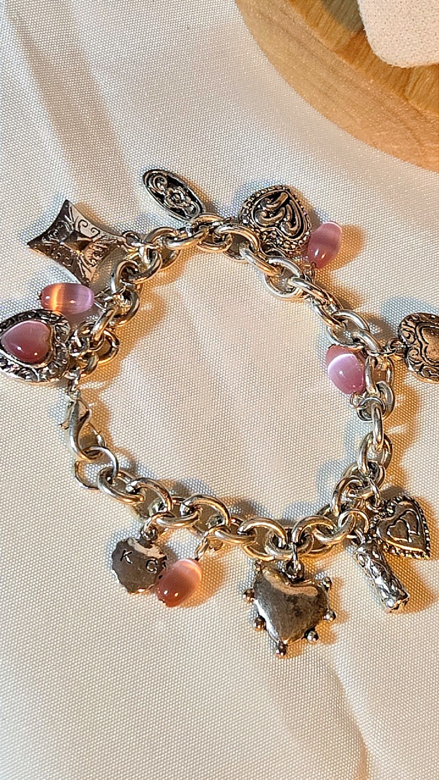 Kenneth Cole Charm Bracelet Silver Tone Pink Cats Eye 90s KC gallery