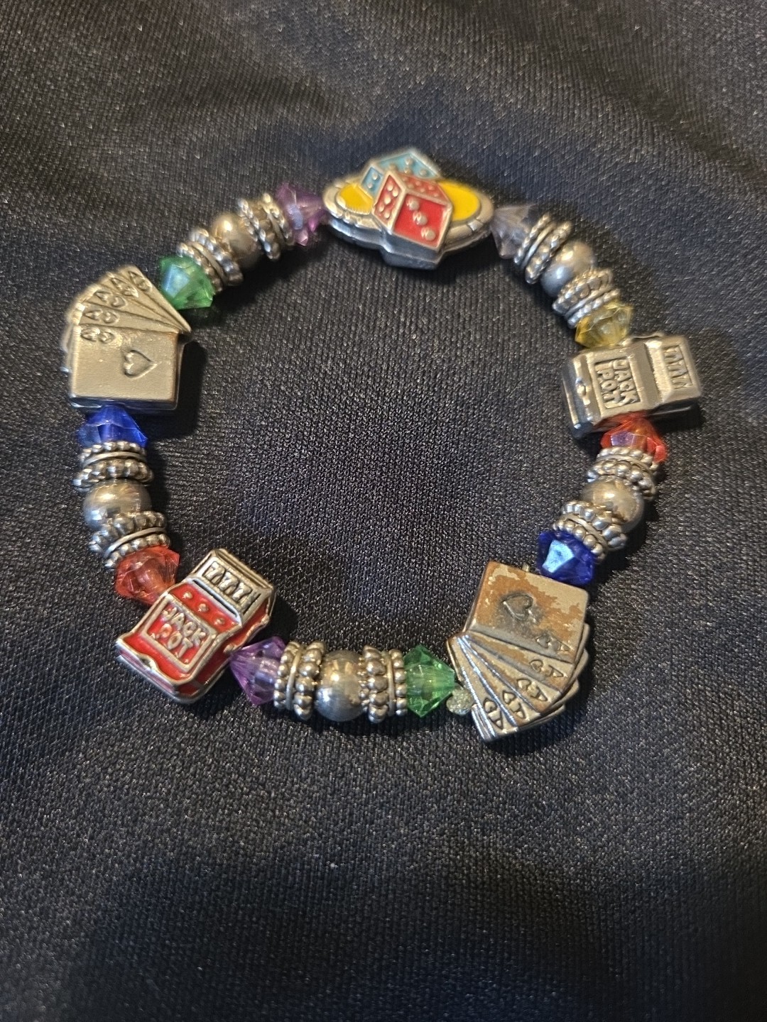 Silver Tone Spring Charm Bracelet With Dice Playing Cards And Slot Machines gallery