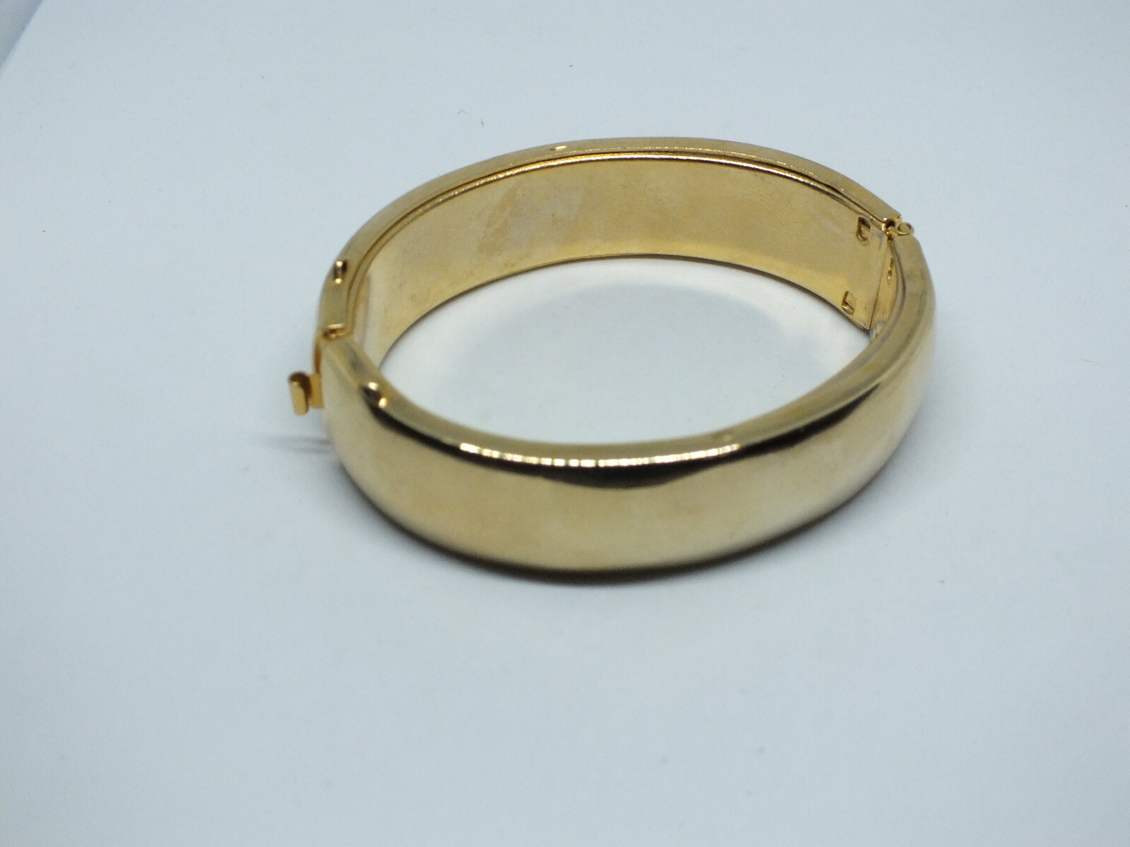 Beautiful Clasp Bracelet Gold Tone Smooth Finish 3/4" Wide x 2 1/2" Across ID gallery