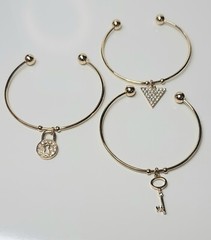 3 Gold Bracelets With Charms And Rhinestones. Squeeze To Size.