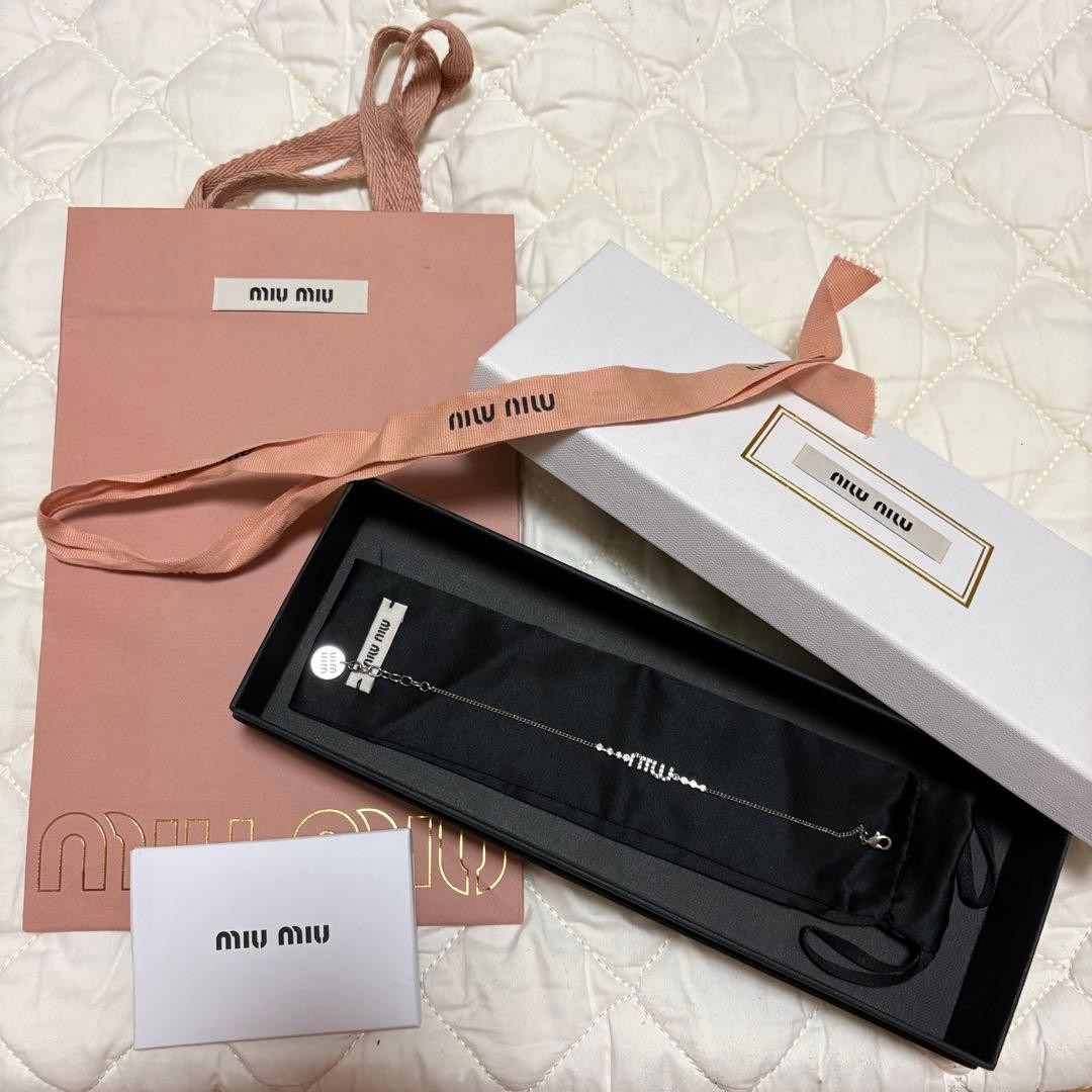 Miu Miu bracelet with silver logo and crystals from Japan used gallery