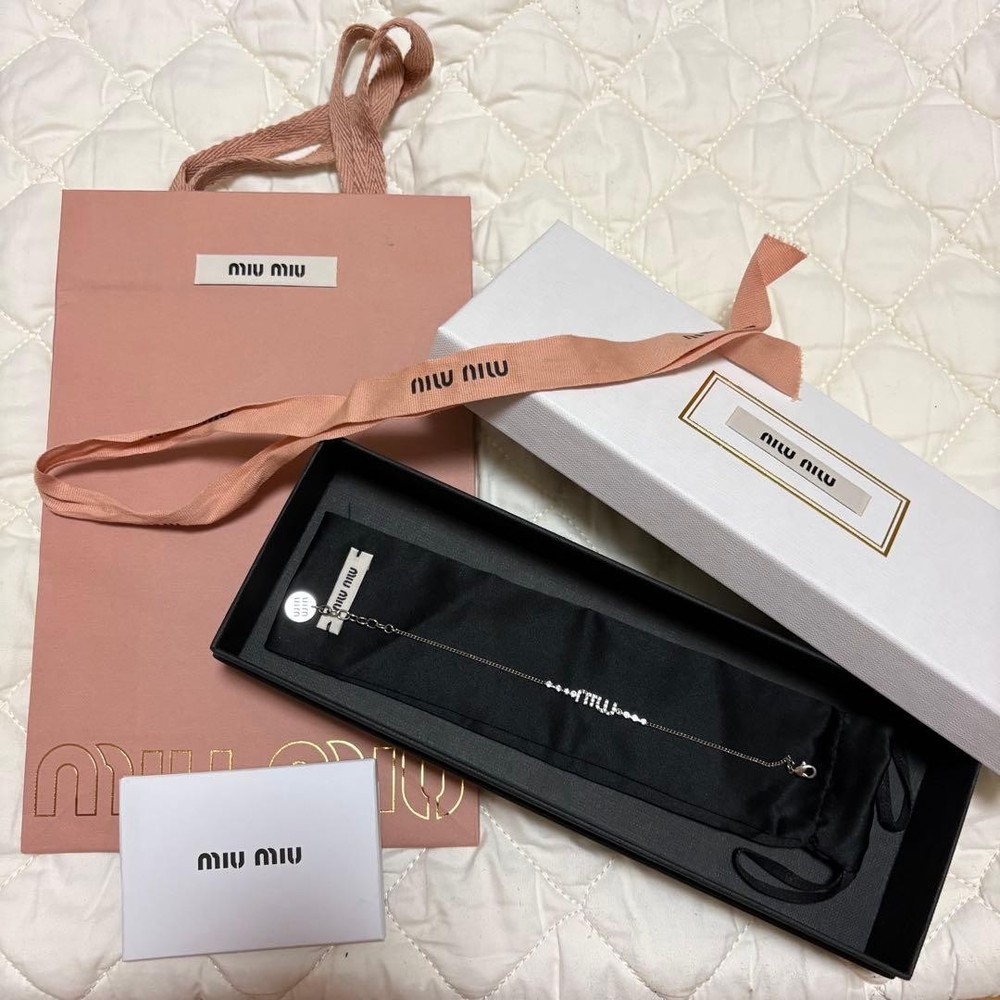 Miu Miu bracelet with silver logo and crystals from Japan used
