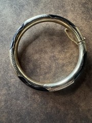 Black onyx gold plated hinged bangle bracelet