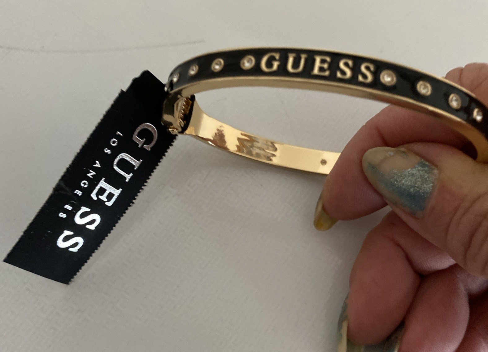 NEW GUESS Los Angeles Black On Gold Tone Rhinestone Logo Bracelet gallery