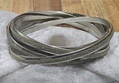 …Joined Entwined Six(6) Gold Tone, Inset Sparkly Silver Tone Bangle Bracelets.