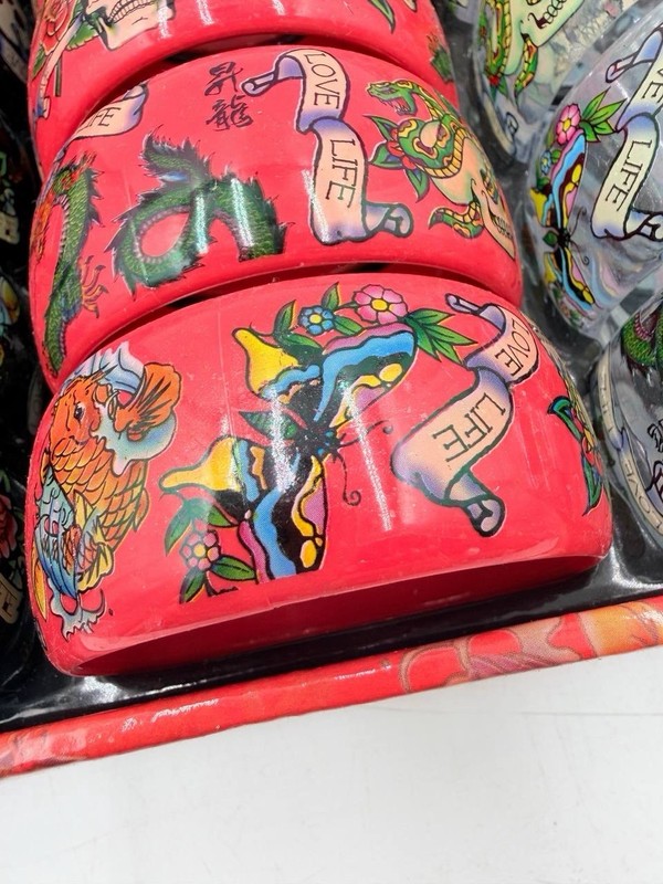 Lot of 24 Rock Out! Tattoo Style Plastic Bangle Bracelets Mixed Colors Punk Emo gallery
