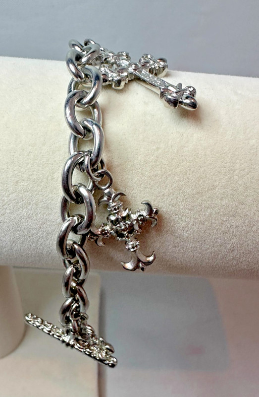 Cross religious silver tone cross 5 charm toggle bracelet. 26.97g L-8 in. gallery