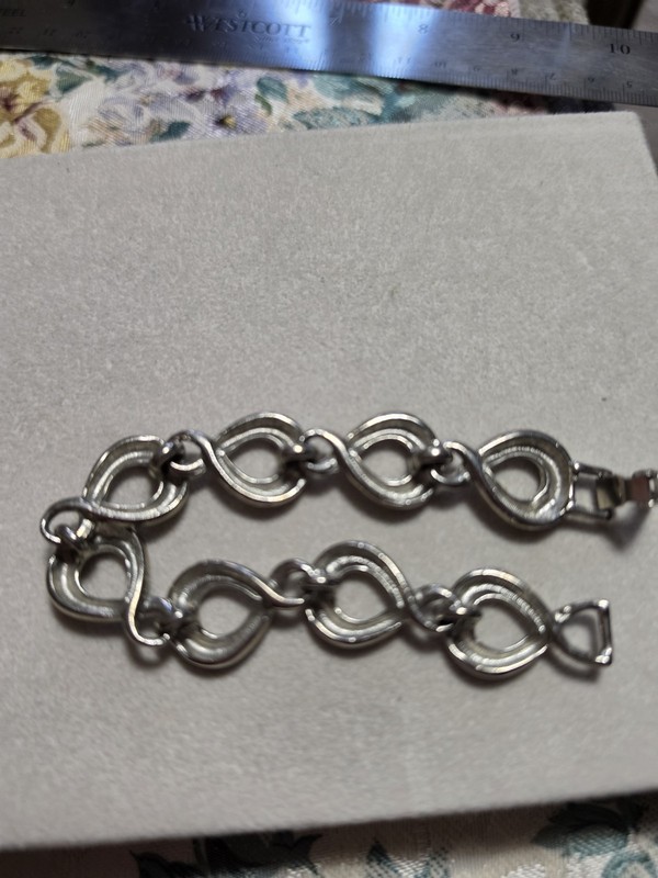 Silver Tone infinity Bracelet 7" gallery