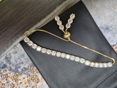 8inch Gold Plated Tennis Bracelet With 12.5ct Oof GRA Certified Moissanites.