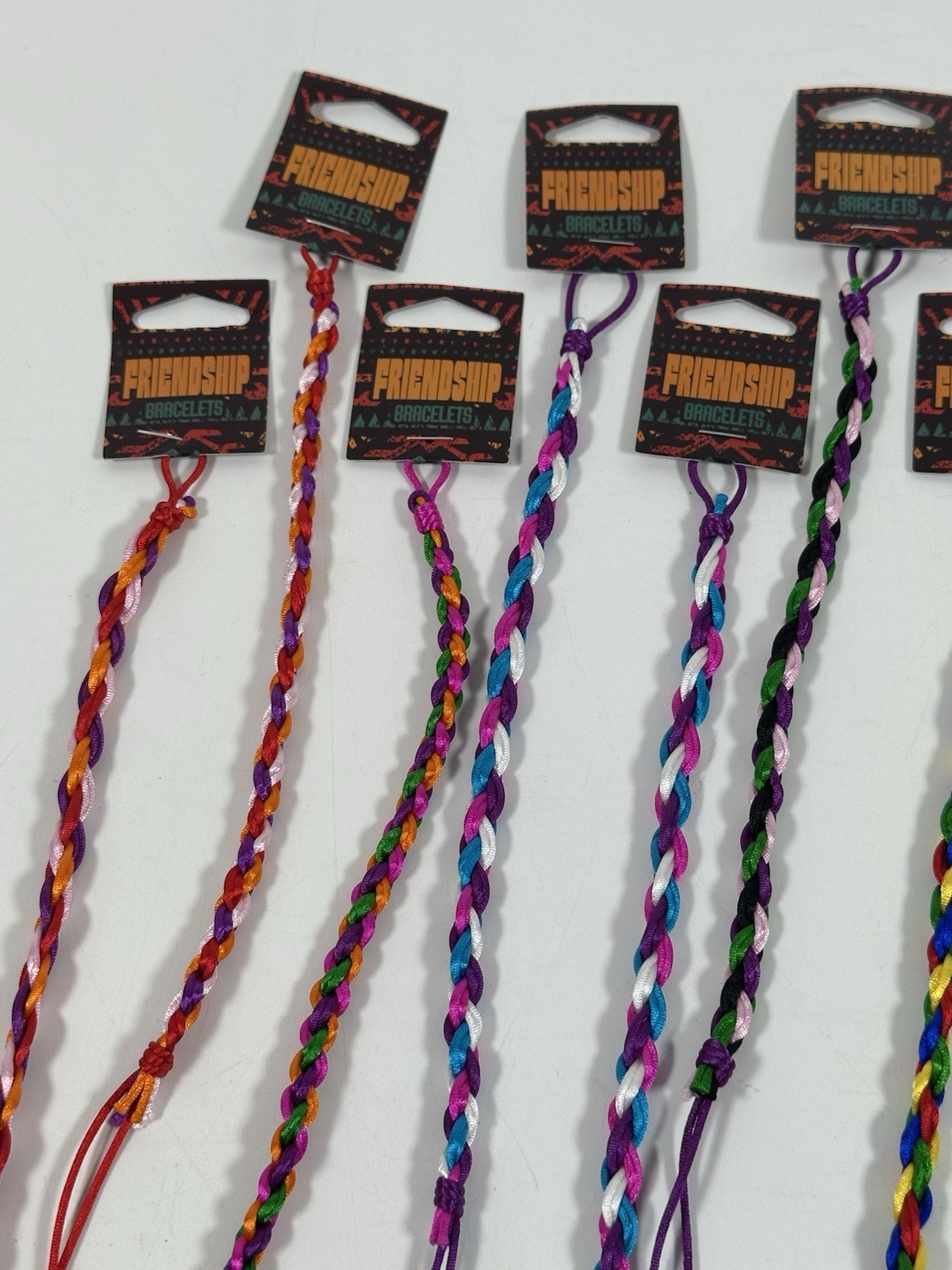 Lot of 12 Friendship Bracelets New Tags Braided Cord Multicolor Tie On gallery