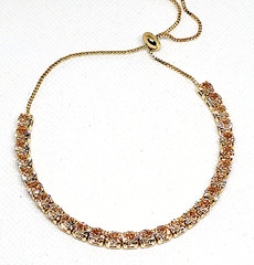 Champagne Cubic Zirconia adjustable bolo tennis bracelet 6-9 inches in goldtone