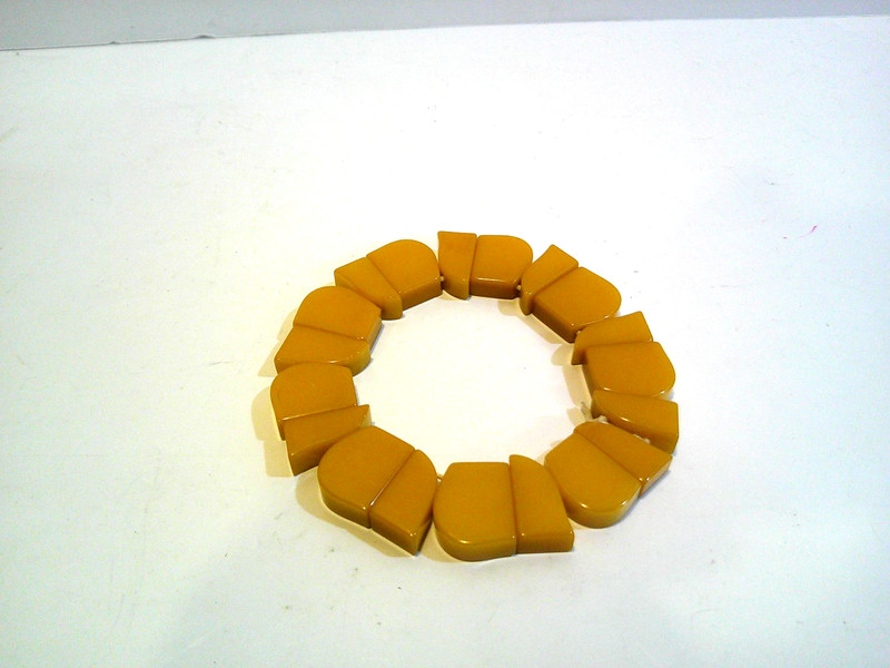 Bakelite Stretch Bracelet - Vintage 2in and up Orange Bangle gallery